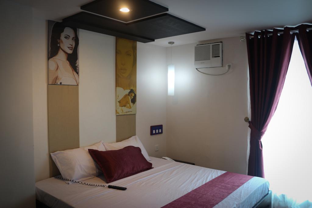 Icon Hotel North Edsa Ciudad Quezon Habitación foto