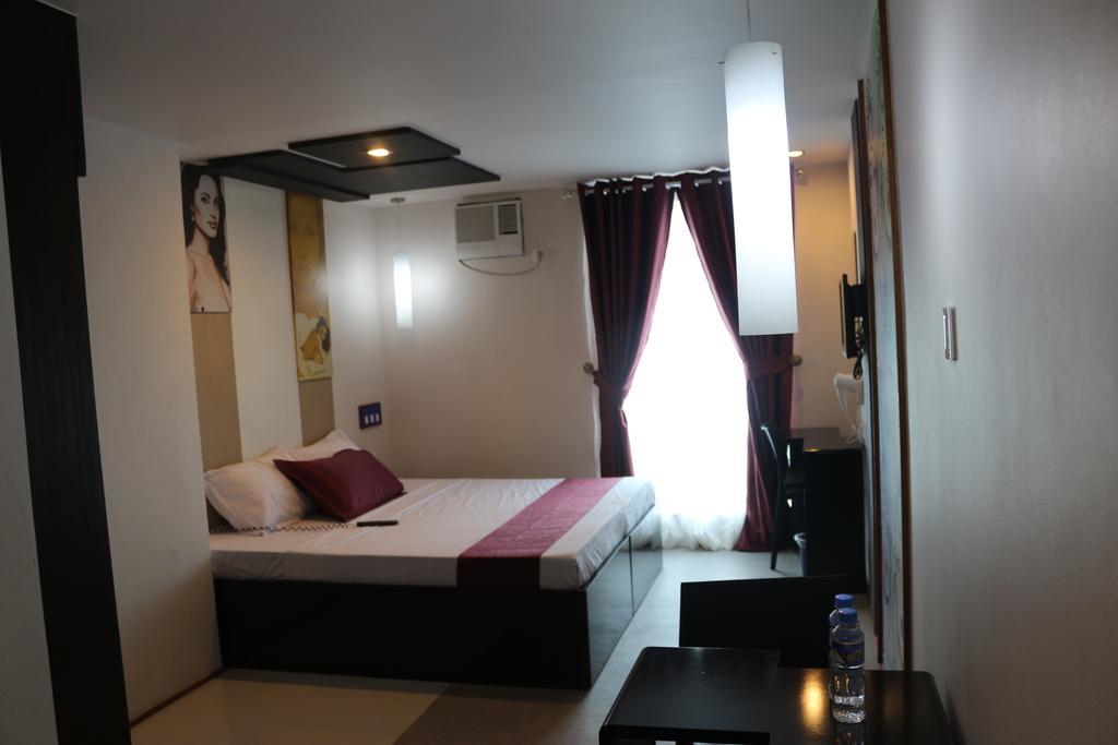 Icon Hotel North Edsa Ciudad Quezon Habitación foto